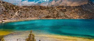 Inca Trail or Salkantay Trek: Which One to Choose in 2026? 3 Photo of Humantay Lake, high-altitude turquoise lagoon in the Andes